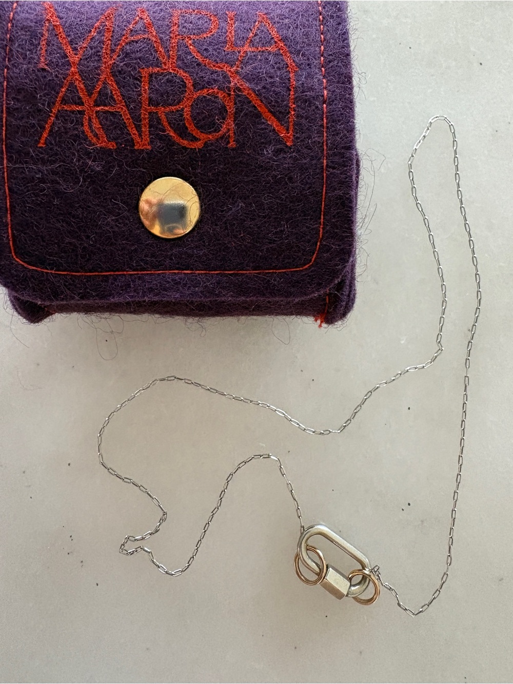 Marla Aaron 10ktWG & 18kYG 15 in necklace & SS Baby Lock set. Comes with pouch